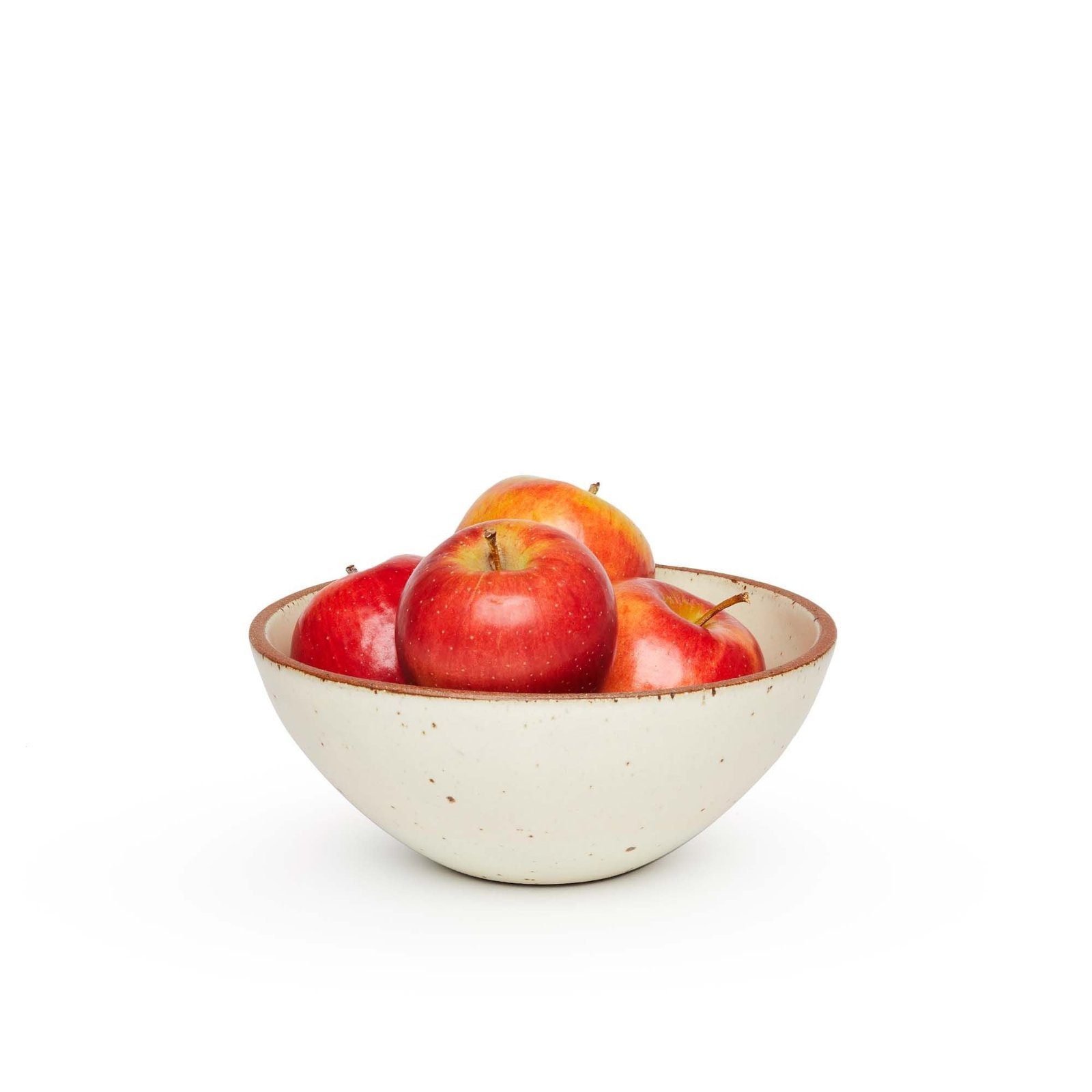 Verllage soup bowl in Oat Cream, shown with apples