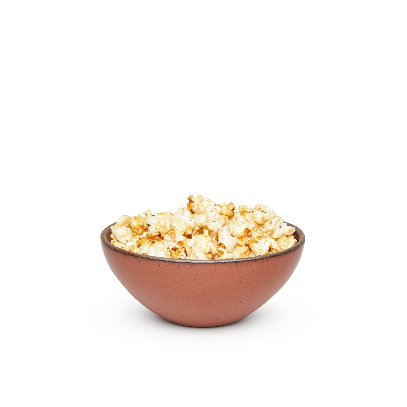 Verllage soup bowl in Terracotta, shown with popcorn